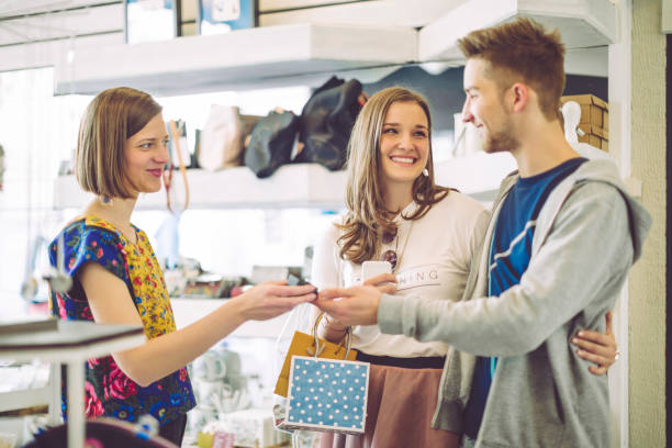 istock Young couple in the shopping mall 669638076
