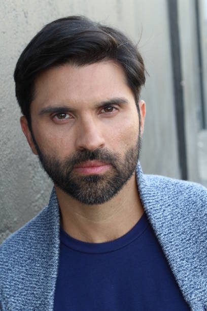 istock Handsome brunette bearded male isolated 669638220
