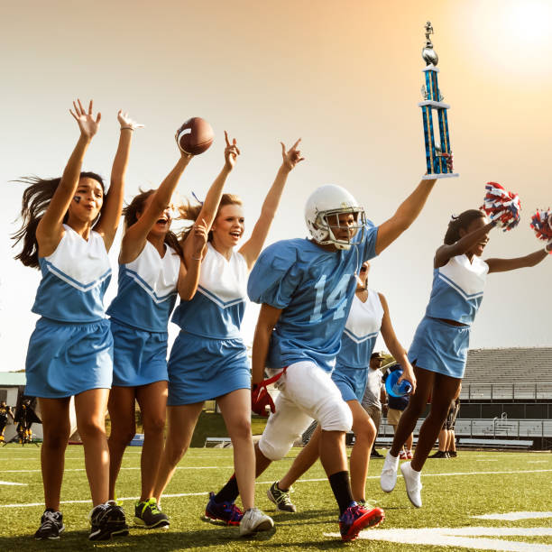 istock Football Cheerleaders & Player 669638600