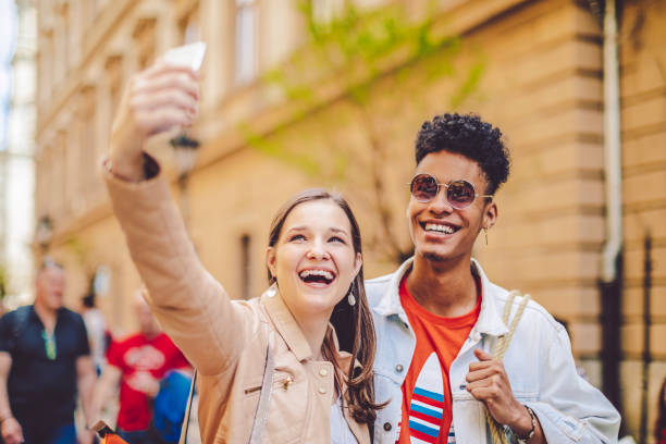 istock Young couple spending time together in the city 669638608