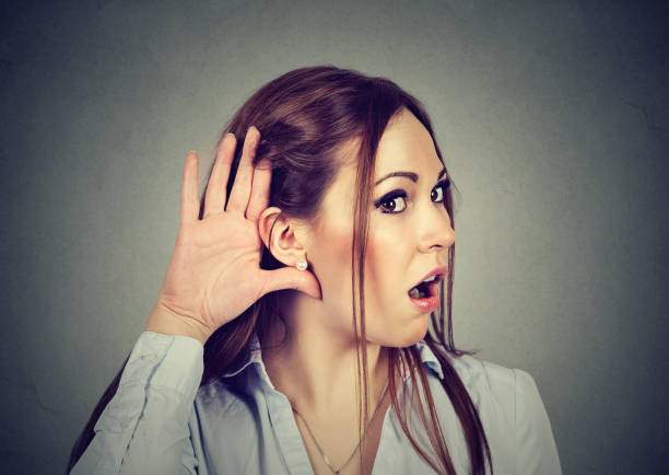 istock Shocked woman eavesdropping. Rumors and gossips concept. 669638834