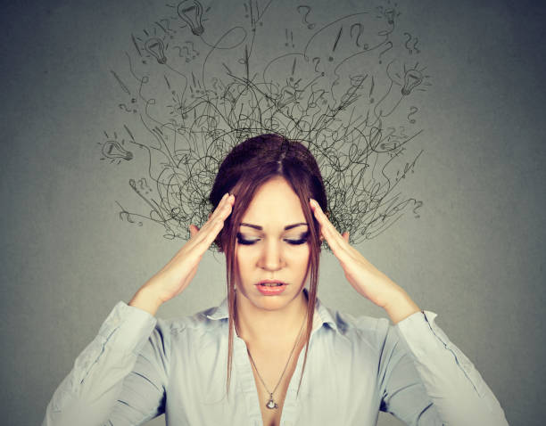 istock sad young woman with worried stressed face expression and brain melting into lines question marks 669638992