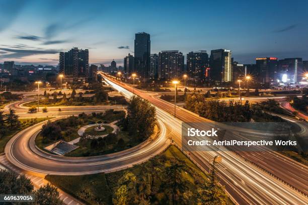 City Traffic Of Beijing At Dusk Stock Photo - Download Image Now - Ring - Jewelry, Road, Circle