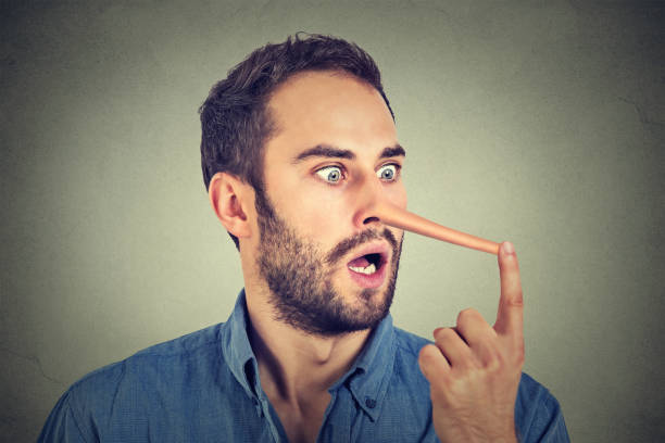 istock Man with long nose isolated on grey wall background. Liar concept 669641678
