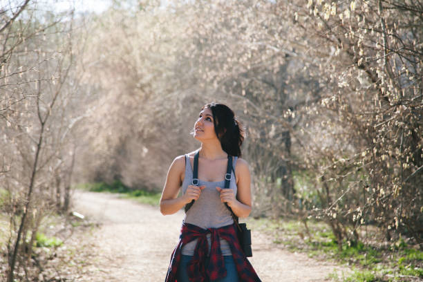 istock Young woman walking on the field 669642630