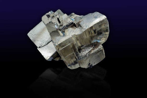 istock Pyrite mineral on black background 669653344