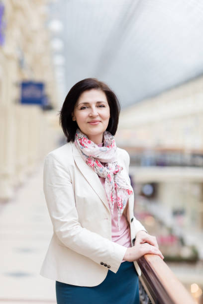 istock Businesswoman 50 years old in a white jacket 669657104