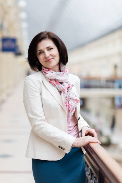 istock Businesswoman 50 years old in a white jacket 669657138