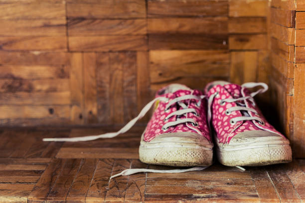 istock Step up your style, canvas Sneakers on wooden background 669670220
