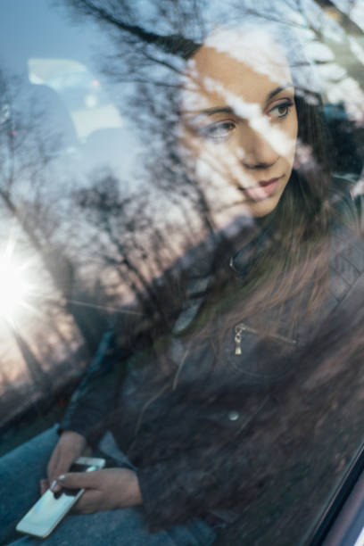istock Girl sitting in a car 669673192