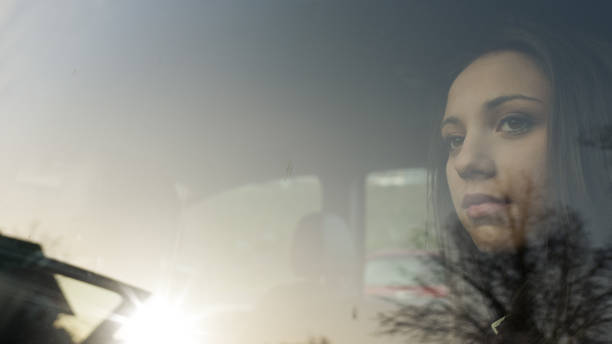 istock Girl sitting in a car 669673244
