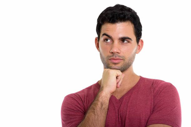 istock Close up of young handsome Hispanic man thinking while looking up 669673340