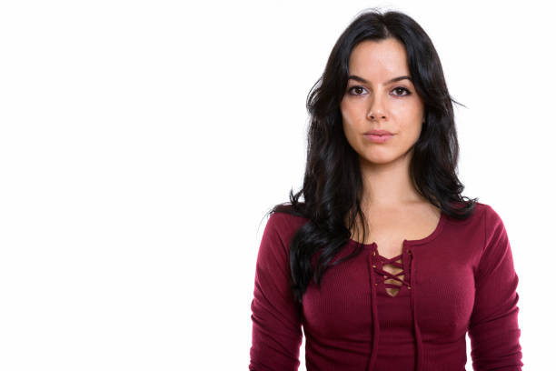 istock Studio shot of young beautiful Spanish woman looking at camera 669673640