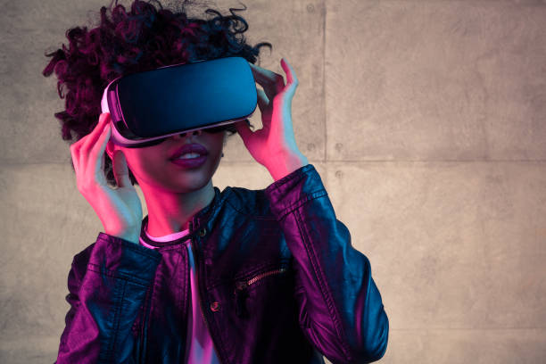Young girl with VR goggles on head