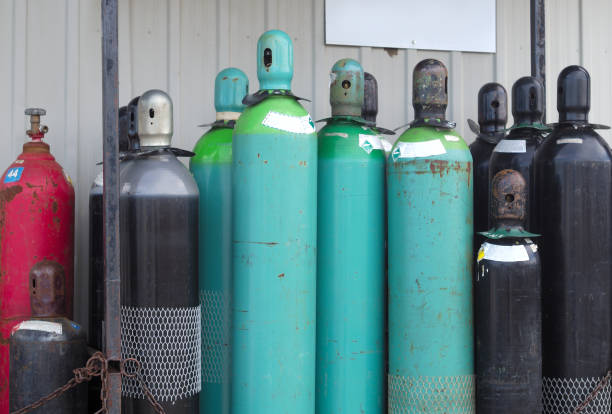 istock empty tanks propane oxygen nitrogen chemical gas bottles 669678036