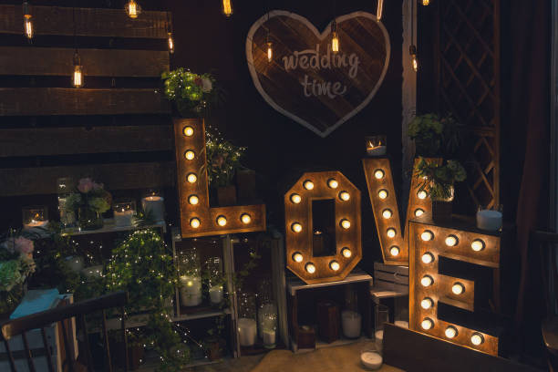 istock Sign of love with a light bulb and a candle 669681148