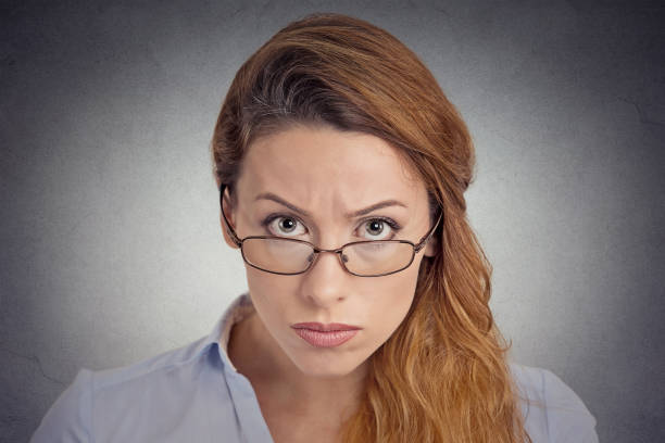 istock Angry grumpy doubtful woman looking at you camera 669685424