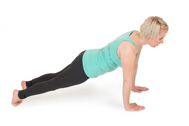 istock Yoga woman green position_198 669687678