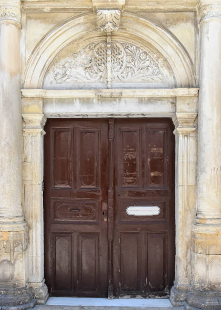 istock Old wooden brown door in Rethymnon. Greece 669692590