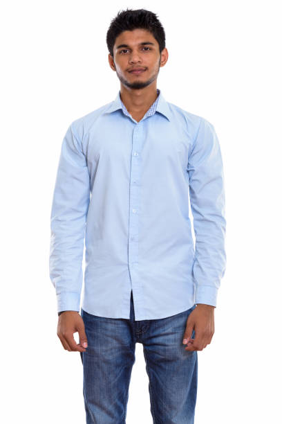 istock Studio shot of young handsome Indian man standing 669698572