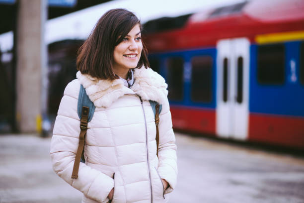 istock Brunette Girl At Train Station 669708476