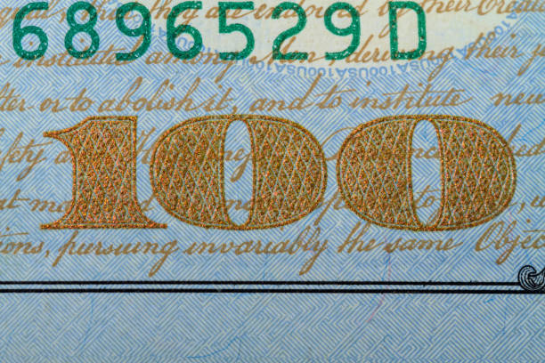 istock Number one hundred on a banknote 100 dollars 669708690
