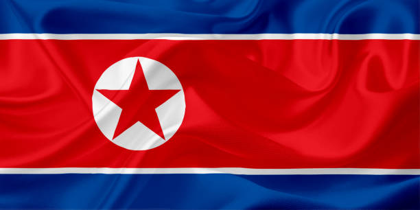 istock Waving flag of North Korea with fabric texture 669712824