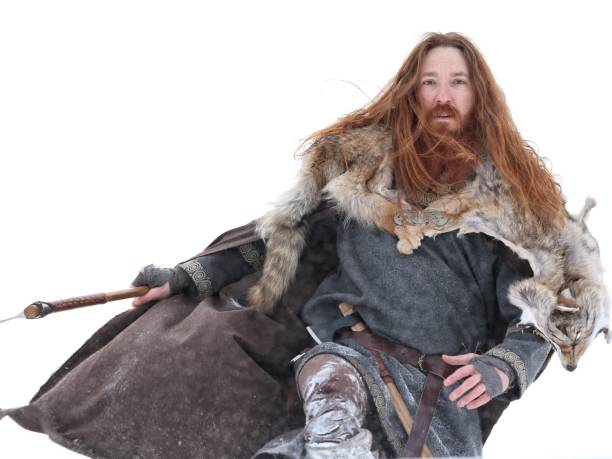 istock Medieval Winter Snow Viking Warrior, Authentic Costume, Animal Pelt, Ax 669715710