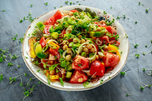 istock Chickpea salad with tomato, avocado, basil and olive oil 669718610