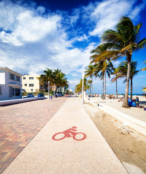 istock Hollywood beach Florida boardwalk bicycle lane sunny Winter day 669718996