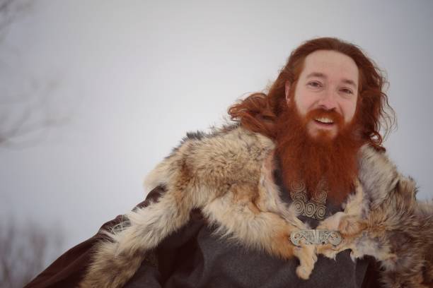 istock Medieval Winter Snow Viking Warrior, Authentic Costume, Animal Pelt, Smiling 669722856