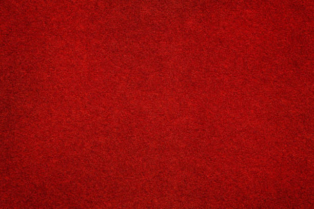 la superficie roja de fieltro de cerca. textura y fondo - felt textured textured effect textile fotografías e imágenes de stock
