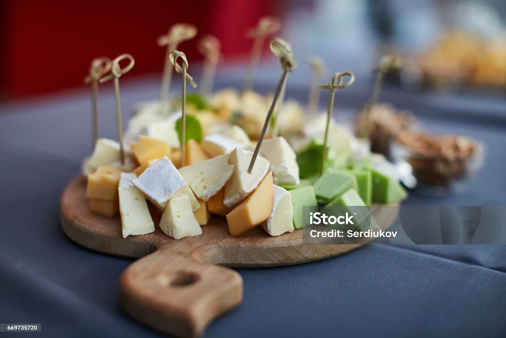 cheese platter, Assorted with nuts and honey cheese platter, Assorted with nuts and honey on a plate Appetizer Stock Photo