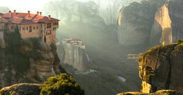 serene morning in impressive meteora monasteries. central greece - european culture spirituality traditional culture famous place imagens e fotografias de stock