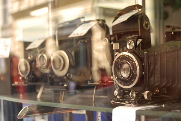 istock 4 vintage folding cameras in a window 669764856