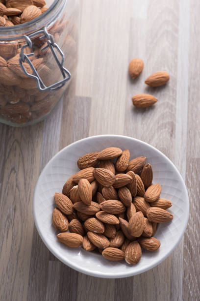 istock Bowl of whole almonds 669765836