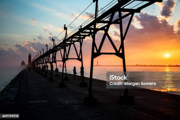 Lake Michigan Sunset Stock Photo - Download Image Now - Grand Haven, Michigan, Building Exterior