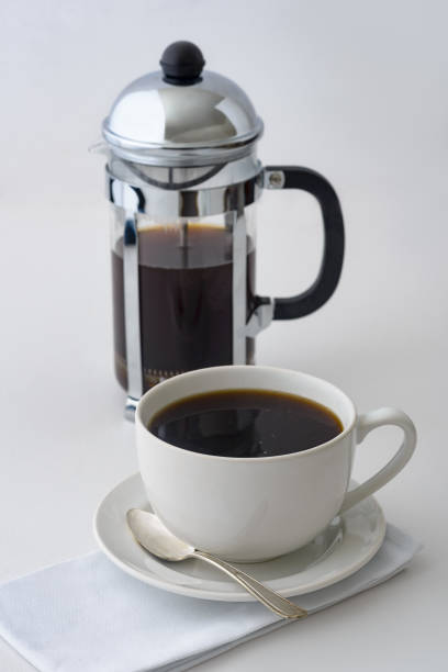 istock Fresh brewed coffee from a french press 669771716