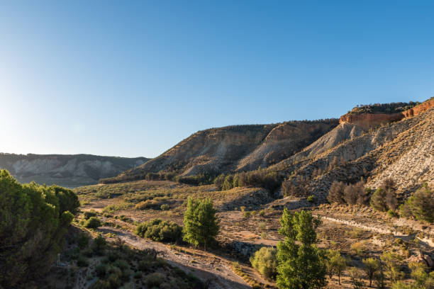 istock sunset over a canyon in the mountains 669775510