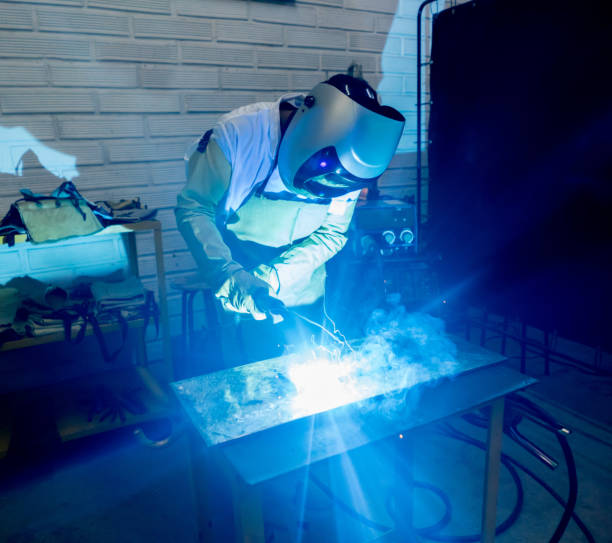 istock Industrial welder welding at the workshop 669775632