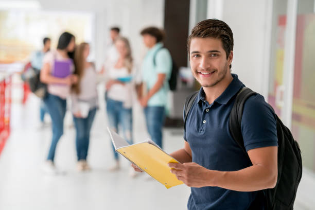 istock Happy male student at the university 669775716