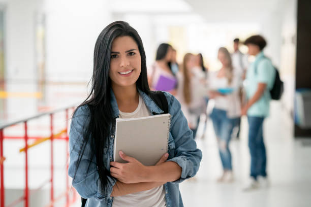 istock Happy female student at the university 669775748