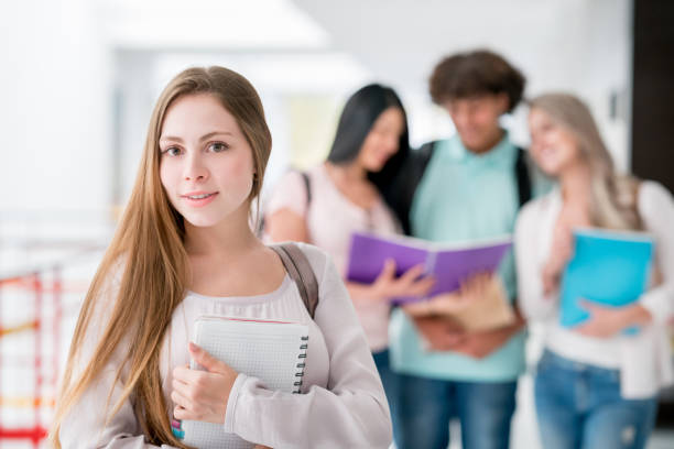 istock Happy female student at the university 669775756