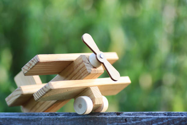 istock wooden toy airplane 669776022