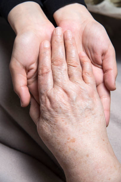 istock Hands Of Young And Old Woman 669780164