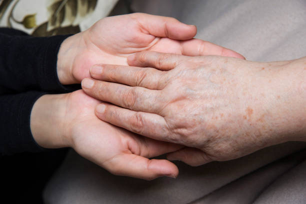 istock Hands Of Young And Old Woman 669780166