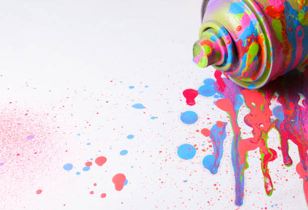 istock Spray paint on white background. Drops of paint around. 669789220