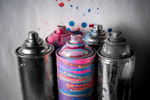 istock aerosol paints on a dirty gray background. 669789480