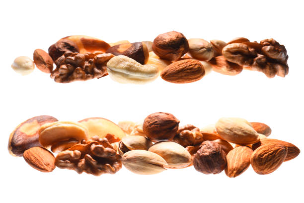 istock Two set of peeled nuts on white background. Horizontal composition. 669792874