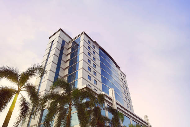 istock Skyscraper business building with window glass in evening light 669793548
